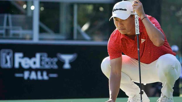 Collin Morikawa prepares to putt on the 17th green in the final round of the 2023 Zozo Championship in Japan.
